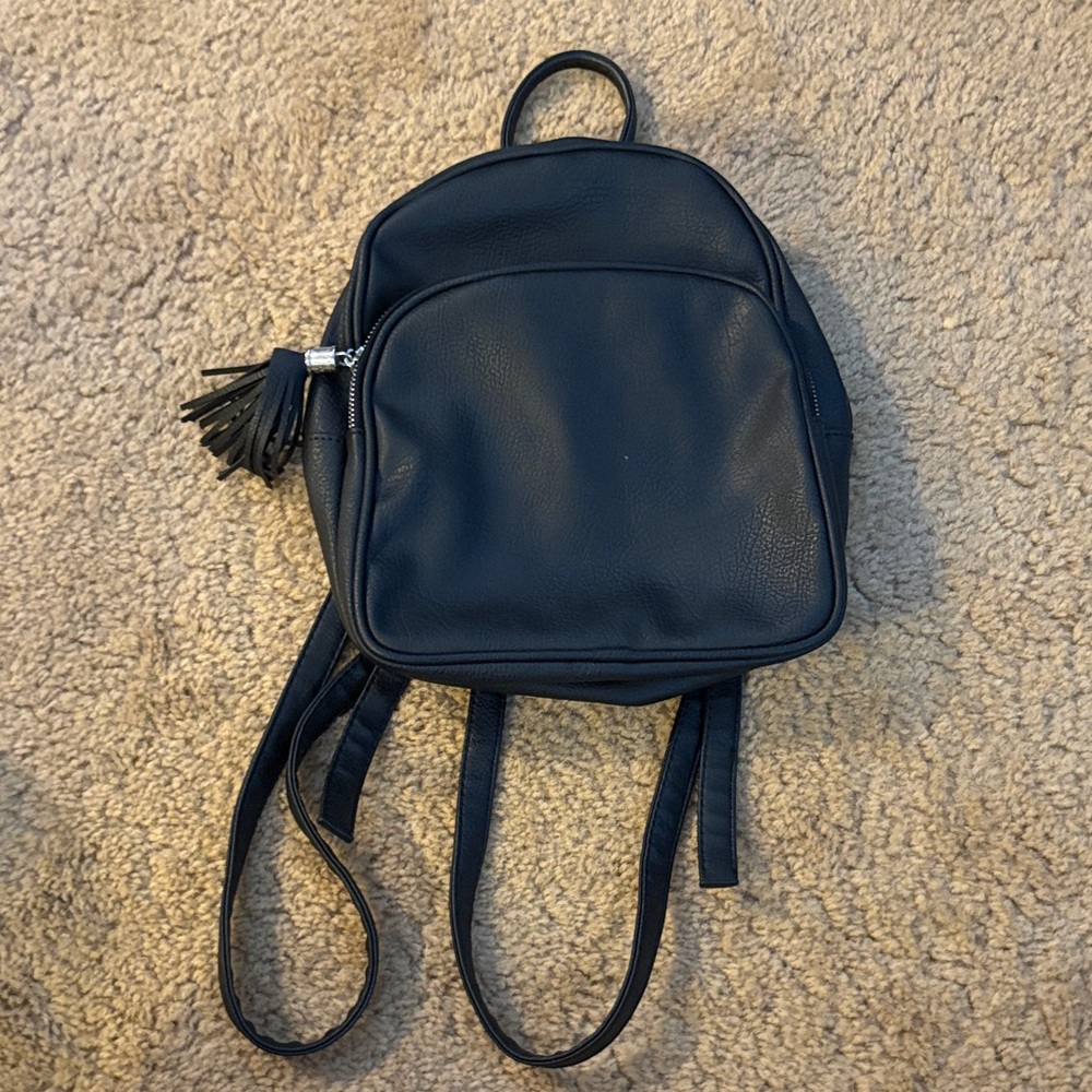 Stylish Black Backpack with Tassel